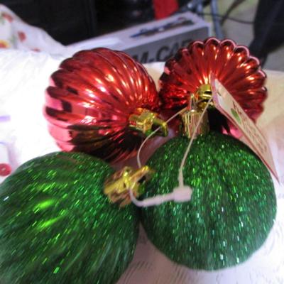11 Christmas ornaments, 14 red shiny leaf stems, sequins & sequins pins