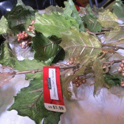 Large poinsettias & holly with berries