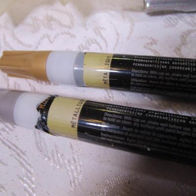 Paint markers, 4" Styrofoam balls, white glittery star, battery operated light