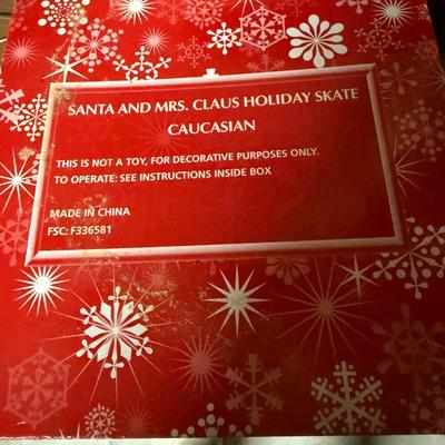 Santa & Ms Claus skating