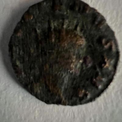 Bronze Roman coin circa 370 AD. 1 inch