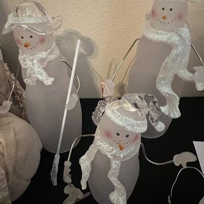 3 Snowmen and Santa Claus