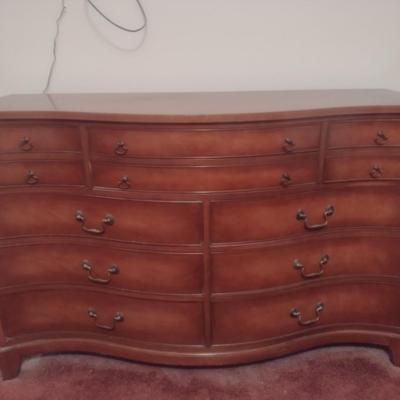 Twelve Drawer Serpentine Front Wooden Dresser- Measures Approx 56" x 21" x 36" Tall