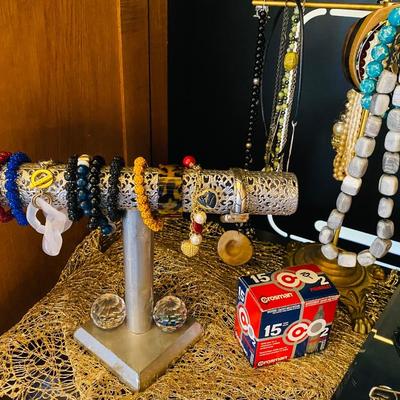 Lot 2: Brown Couch, Entertainment Center, Jewelry Selection & More