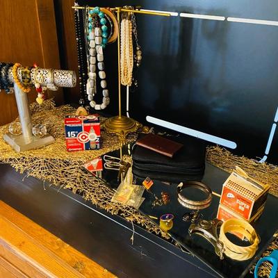 Lot 2: Brown Couch, Entertainment Center, Jewelry Selection & More