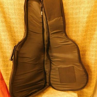 Sale Photo Thumbnail #56: Comes with on board tuner with bass, middle, treble, and gain adjustment. The Gig bag is from Wolfpak (Lots of storage). In good working condition, tested! Model #GY11 ME-NS