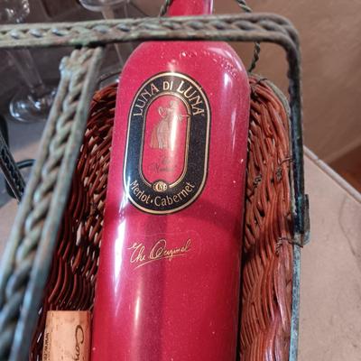 TALL EMPTY CHAMPAGNE BOTTLE, WINE RACK, BOTTLE HOLDER AND 4 STEMMED GLASSES
