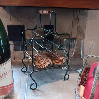 TALL EMPTY CHAMPAGNE BOTTLE, WINE RACK, BOTTLE HOLDER AND 4 STEMMED GLASSES
