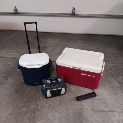 COLEMAN KWIK SERV COOLER AND ANOTHER ON WHEELS PLUS A LUNCH BAG AND UMBRELLA