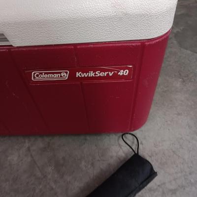 COLEMAN KWIK SERV COOLER AND ANOTHER ON WHEELS PLUS A LUNCH BAG AND UMBRELLA