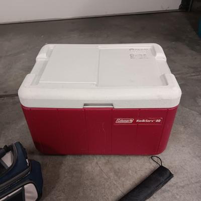 COLEMAN KWIK SERV COOLER AND ANOTHER ON WHEELS PLUS A LUNCH BAG AND UMBRELLA