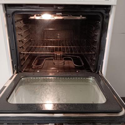 GE ELECTRIC OVEN IN A 3 DRAWER DROP LEAF CABINET ON CASTERS