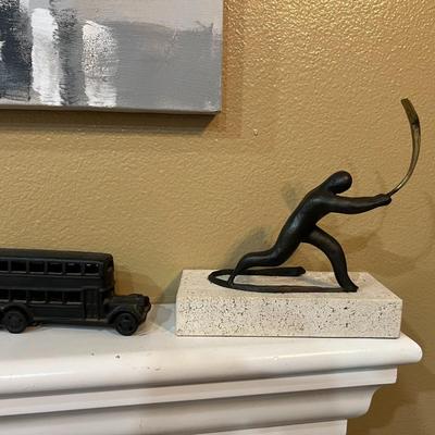 Cast Bus and Man Statue