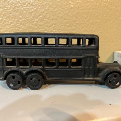 Cast Bus and Man Statue