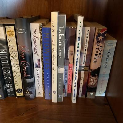 AN ASSORTMENT OF BOOKS