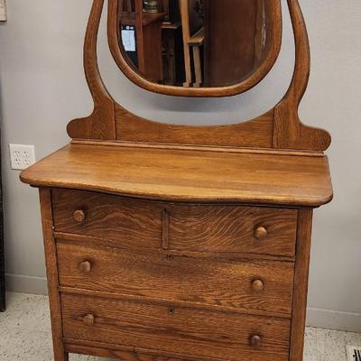 Oak dresser with harp and beveled mirror