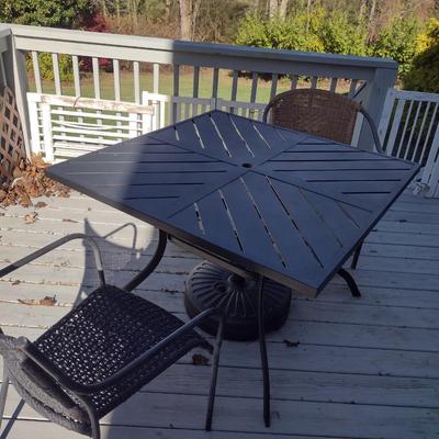 Metal Patio Table with Umbrella Stand and Two Mismatched Chairs