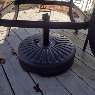 Metal Patio Table with Umbrella Stand and Two Mismatched Chairs