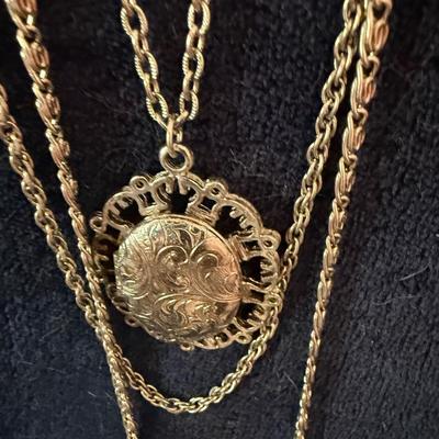 Locket & pair of clip earrings