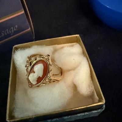 Avon watch, courage, ring