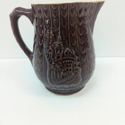 Antique Brown Stoneware Pitcher With Brown Glaze House Relief Pattern