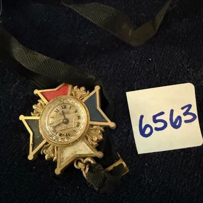 Possible Masonic watch on a black ribbon