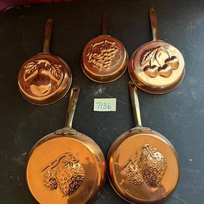Copper pans with brass handles