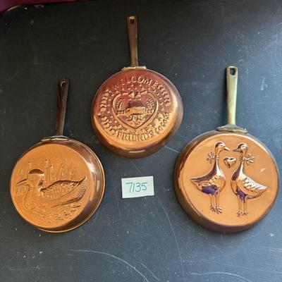 Copper pans with brass handles