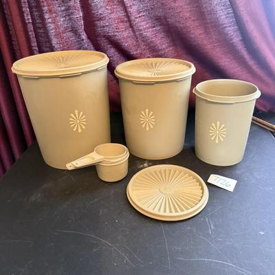 Cannisters set with extra lid & measuring cups