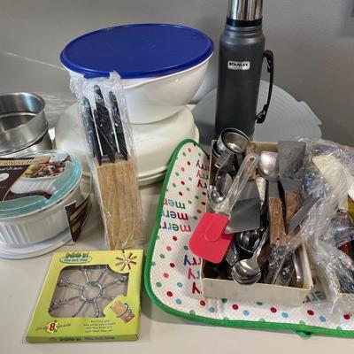 Kitchen items including Tupperware and Corningware