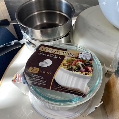 Kitchen items including Tupperware and Corningware