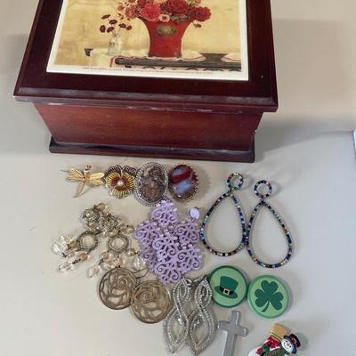 Earrings, brooches and jewelry box