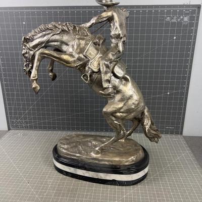 "The Bronco Buster" by Frederic Remington in Silver