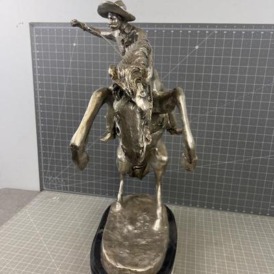 "The Bronco Buster" by Frederic Remington in Silver