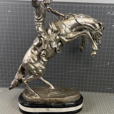 "The Bronco Buster" by Frederic Remington in Silver