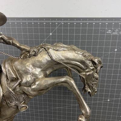 "The Bronco Buster" by Frederic Remington in Silver