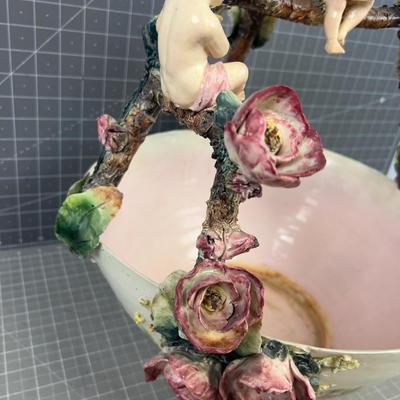Cape Demonte Center Piece WOW!!! Cherubs, Twigs and Flowers