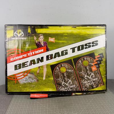 New in the Box, also in Plastic.  Bean BAG BOX NEW