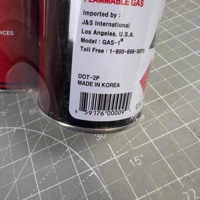(4) NEW BUTANE CANS