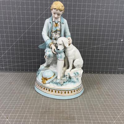 Bisque Porcelain Man feeding a Dog. NICE! 