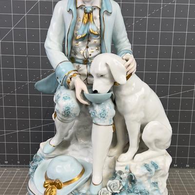 Bisque Porcelain Man feeding a Dog. NICE! 