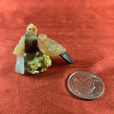 Hand-Carved Soapstone Birds on Quartz