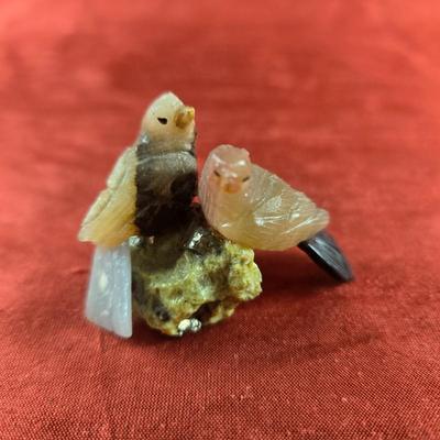 Hand-Carved Soapstone Birds on Quartz