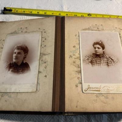 Sale Photo Thumbnail #432: Antique Album as is over 100 years old 11" x 8.5" x 2.5", 5 photo frames. 2 of the frames are 3.5" x 4", and 3 frames are 2.5" x 2 3/4" x 1/4".  An as is dictionary and religious on wood Mary and child.  8 items total.  Daguerreotypes. Ambrotype.  Tintype