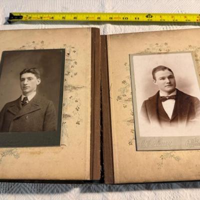 Sale Photo Thumbnail #450: Antique Album as is over 100 years old 11" x 8.5" x 2.5", 5 photo frames. 2 of the frames are 3.5" x 4", and 3 frames are 2.5" x 2 3/4" x 1/4".  An as is dictionary and religious on wood Mary and child.  8 items total.  Daguerreotypes. Ambrotype.  Tintype