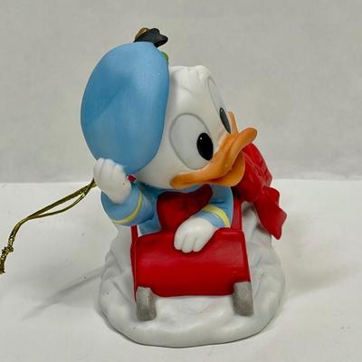 Vintage 1984 Baby Donald Duck Red Sled Christmas Tree Ceramic Ornament