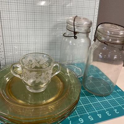 Yellow depression glass plates And jars
