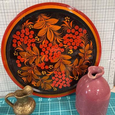 Painted wood plate with pitchers and doilies