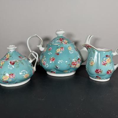 LOT 61K: Gracie China by Coastline Imports Teapots - one w/ Matching Sugar Bowl & Creamer, one w/ Matching Teacups & Saucers