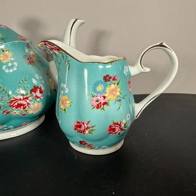 LOT 61K: Gracie China by Coastline Imports Teapots - one w/ Matching Sugar Bowl & Creamer, one w/ Matching Teacups & Saucers